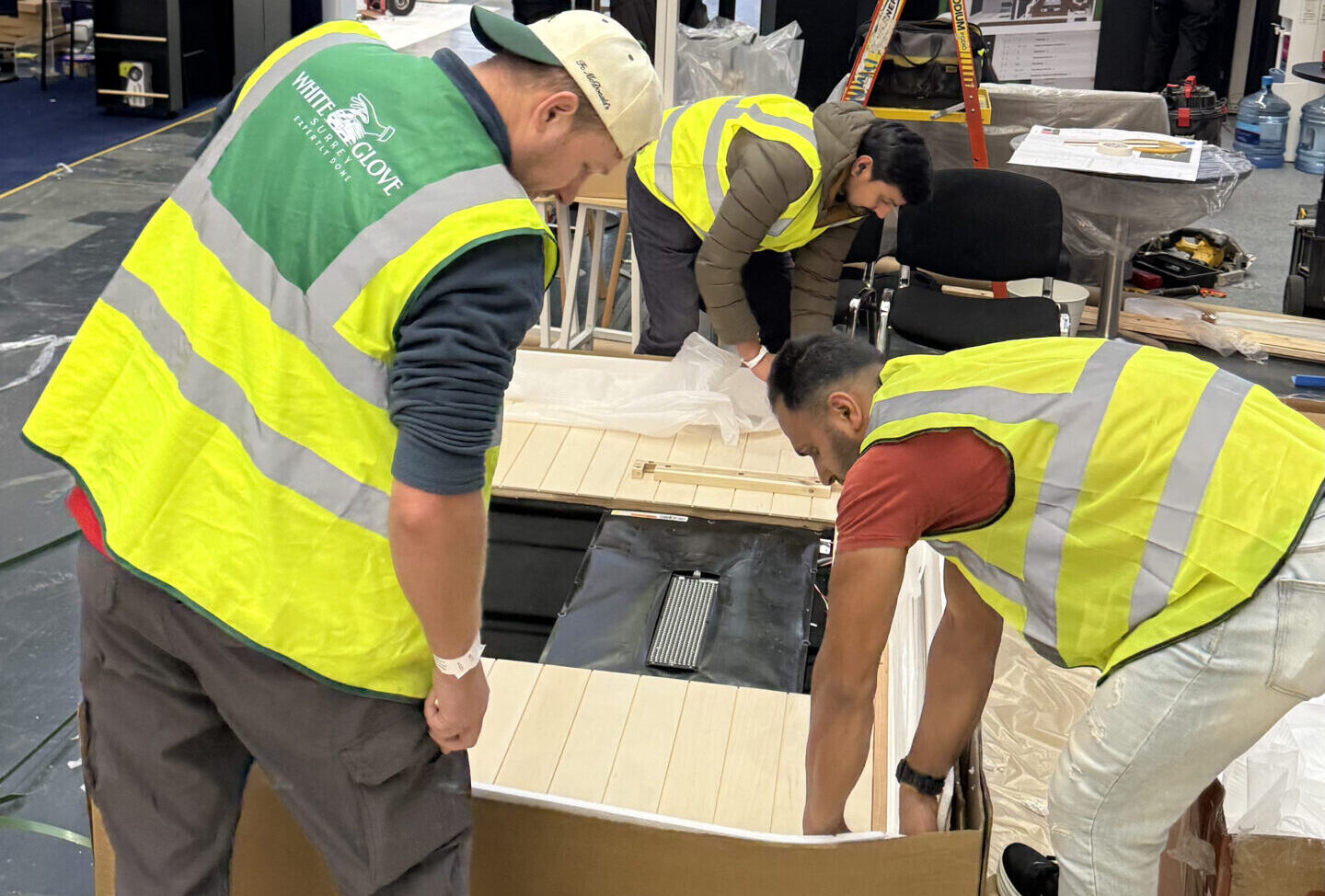 White Glove Surrey team lifting dismantled furniture panels