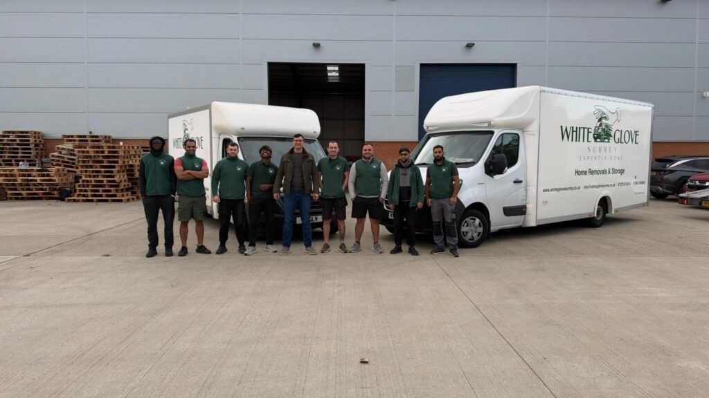 The White Glove Surrey crew outside the depot with the removals fleet