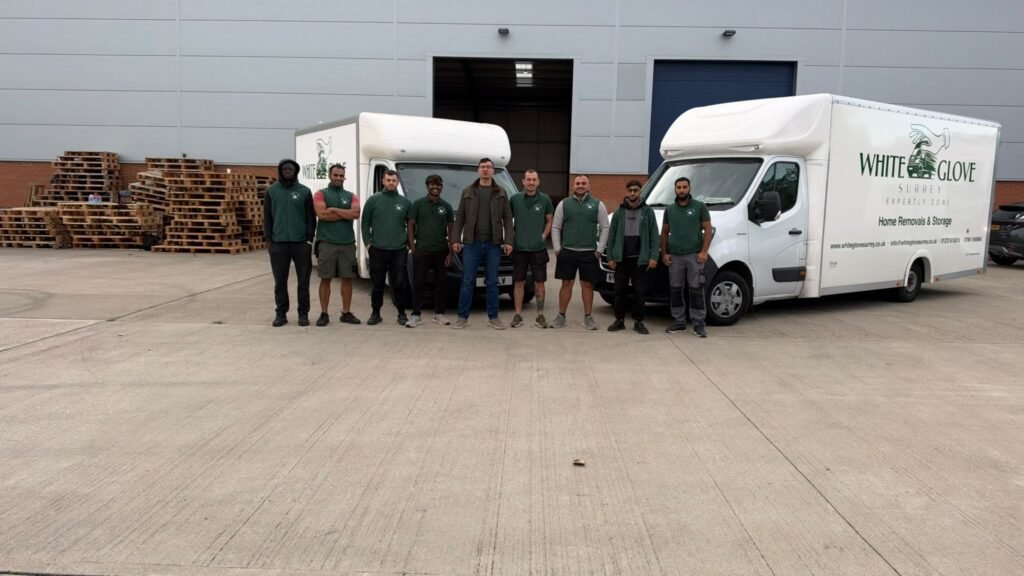 White Glove Surrey movers lined up beside a branded Home Removals and Storage lorry